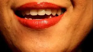 ASMR whisper putting on lipstick mouth & kiss sounds