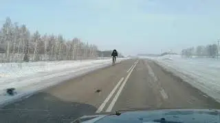 В минус 24 на велосипеде.