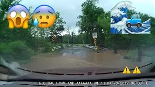 DRIVING THROUGH A FLOOD
