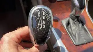Easiest way to replace cracked broken shifter knob on a volvo without removing center console