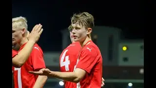 U18s goalscorer Dan Carter reacts to victory in FA Youth Cup
