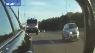 Red Bull lorry overtakes car driving 100mph on the motorway
