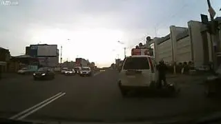 Conflict van a driver with motorcyclist on the road in Russia 1