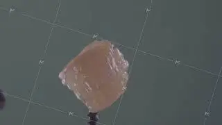 Tangerine rotating with loop on green screen for chroma key