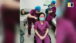 Nurses in Wuhan cut hair to fight against coronavirus outbreak