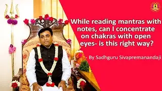 While reading mantras with notes, can I concentrate on chakras with open eyes- is this right way?
