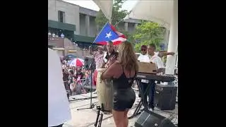 Brenda K. Starr playing congas