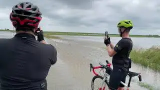 Flooded road a few miles NW of Fisher IL