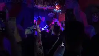 Green Day singer Billie Joe Armstrong goes on stage in random pub