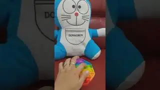 playing pop it with doraemon doll #popit#fingerstyle#doraemon#short#youtubeshorts #viralshorts