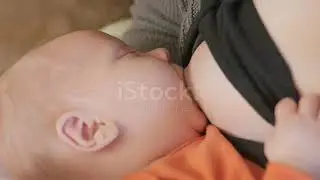 mom breastfeeding a child