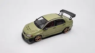 Diecast: Mitsubishi Lancer Evolution IX (9) • 1:64 Scale