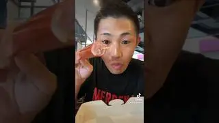 Japanese people eat viral cheese sausages at Indomaret