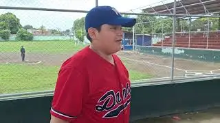 Samuel Guido speaking with father Stearns. Stadium Base Ball
