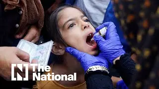 Palestinian parents line up in Khan Younis to vaccinate children against polio