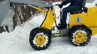 минипогрузчик борьба со снегом
