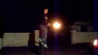 Jugglin fire on giraffe