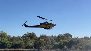 Helicopter water bombers fill up at the end of my street. 21/12/2025