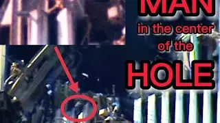 man in the center of the hole in the north tower.