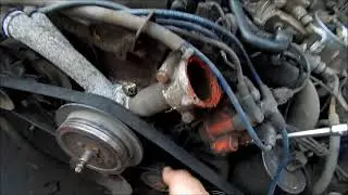 Replacing the belt and tensioner pulley on a Mercedes 124 engine with M102 and 103