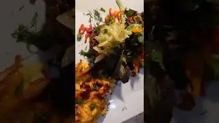 Steak with a side of Poppy seed salad and macaroni and cheese