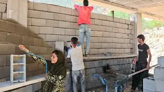 Leila and workers are laying the blocks of Leila and Shahin's dream house.