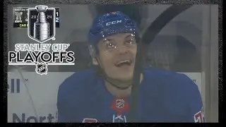 Matt Rempe Admires the Scrum from the Penalty Box