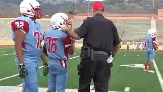 Coaching Community: APD officers coach high school football