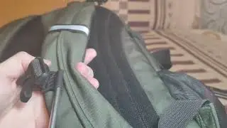 Как вставить ремень грудной стяжки в направляющую на лямке.