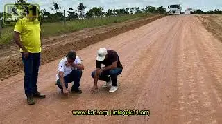 Driving in the rain on a dirt road built using K31-APS only.
