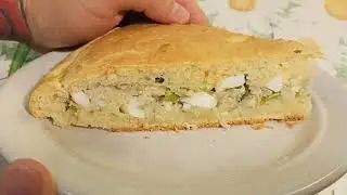 Нежный, заливной пирог с рыбой, яйцом и рисом.