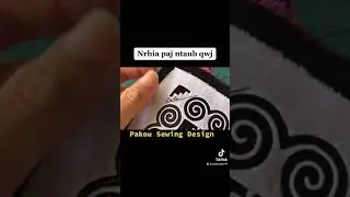 Nrhia paj ntaub qwj by Pakou Her