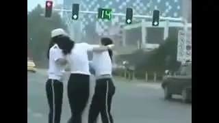 Traffic cops fight in the streets