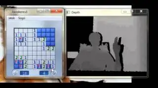 Playing minesweeper with a self-made gesture mouse.