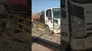 MC1 Prime Coat Bitumen Material Spraying with Sprayer Truck.