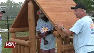 Local volunteers construct new playhouse for Head Start children