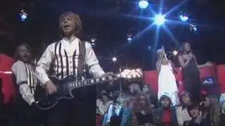 ABBA in the beginning of Disco, "Money Money Money" and leaving the stage.