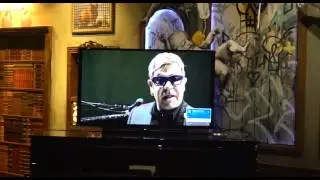 Watch Elton playing the opening party (remotely)