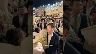 Orthodox Jews dancing with the Torah at the Western Wall in Jerusalem. Israel, 2024
