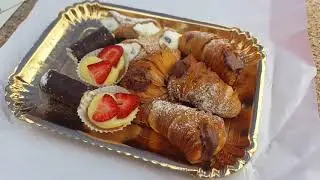 Unboxing sweet pastry in Rome, Italy