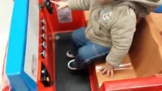 Aditri in a Open Top Toy Car