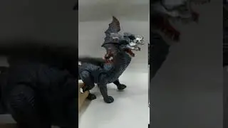 Музыкальный двухголовый динозавр