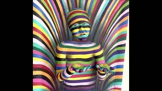 Title: Compassion, Compassion comes in all colors. Wall sculpture by Wendy van Boxtel