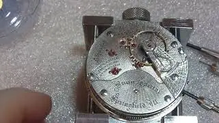 Taking apart Illinois pocket watch