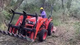 Kubota 2501 bush hogging backwards