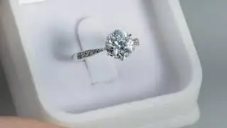 Six Prong Round Cut Diamond Ring With Accent Stones by Brillianteers.com