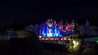 Disneyland's it's a small world Clock at Night with the Lights - Dancing Dolls Spin