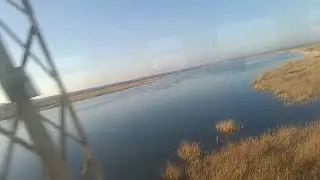 Староминская. Сосыка. Пляж Миру-мир из окна электрички.
