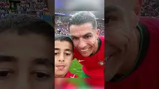 HE TOOK A PICTURE WITH CRISTIANO RONALDO 