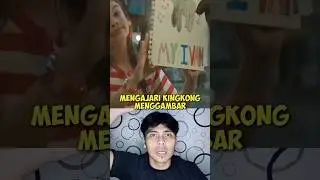 mengajari kingkong menggambar.